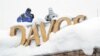 Heavy Snow Humbles Global Elite at Davos Summit