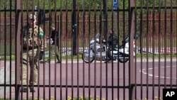 A Russian biker is seen stopped at the border between Belarus and Poland, in Terespol, Poland, April 27, 2015.