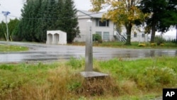 A ditch and short obelisks are all that mark the US-Canada border in northern Whatcom County in Washington state.