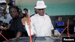 Joseph Nyuma Boakai, Liberia's vice president and presidential candidate of Unity Party (UP), votes at a polling station in Monrovia, Liberia.
