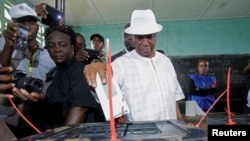 Joseph Nyuma Boakai, Liberia's vice president and presidential candidate of Unity Party (UP), votes at a polling station in Monrovia, Liberia.