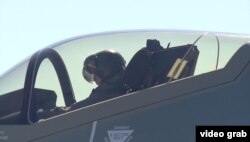 Major Will “D-Rail” Andreotta in the cockpit of an F-35 fighter jet.
