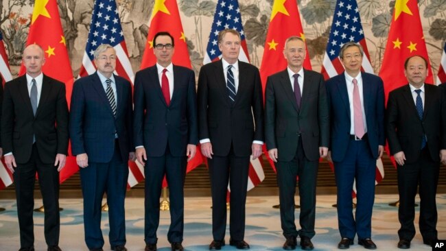 美中两国的贸易谈判代表在北京钓鱼台国宾馆合影。(2019年3月29日)