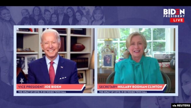 Democratic U.S. presidential candidate Joe Biden smiles as former Secretary of State Hillary Clinton endorses him for president in a video screengrab made during an online town hall, in Wilmington, Delaware, April 28, 2020. (Biden For President/Handout)