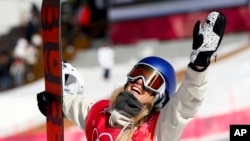 Anna Gasser of Austria celebrates after winning the gold medal in the women's Big Air snowboard final at the 2018 Winter Olympics in Pyeongchang, South Korea, Feb. 22, 2018.