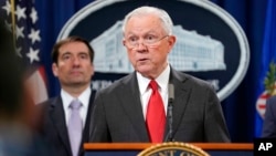 Attorney General Jeff Sessions speaks during a news conference to announce a criminal law enforcement action involving China, at the Department of Justice in Washington, Nov. 1, 2018. 