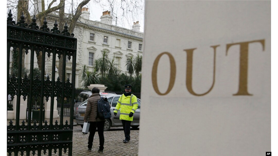 FILE - A van pulls into the grounds of the Russian Embassy in London, March 20, 2018.