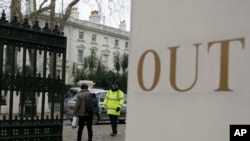 A van pulls into the grounds of the Russian Embassy in London, March 20, 2018.