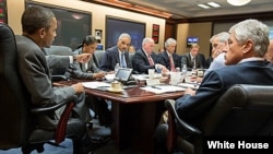 President Barack Obama meets with members of his national security team to discuss the situation in Egypt, in the Situation Room of the White House, July 3, 2013.