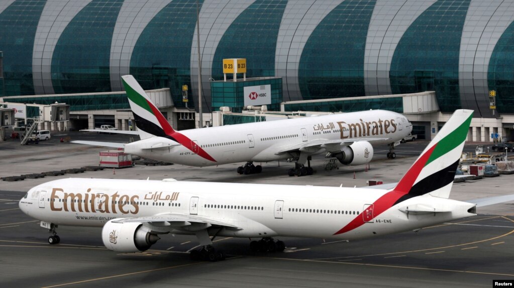 FILE - Emirates Airline Boeing 777-300ER planes are seen at Dubai International Airport in Dubai, United Arab Emirates, February 15, 2019. Several airlines canceled flights to the U.S or changed planes they were using because of concerns about the new 5G service. 