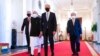 Presiden AS Joe Biden berjalan bersama PM Australia Scott Morrison, PM India Narendra Modi, dan PM Jepang Yoshihide Suga, sebelum dimulainya KTT Quad di Gedung Putih, Jumat (24/9). 