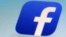 FILE - A Facebook app icon is shown on a smartphone in New York.