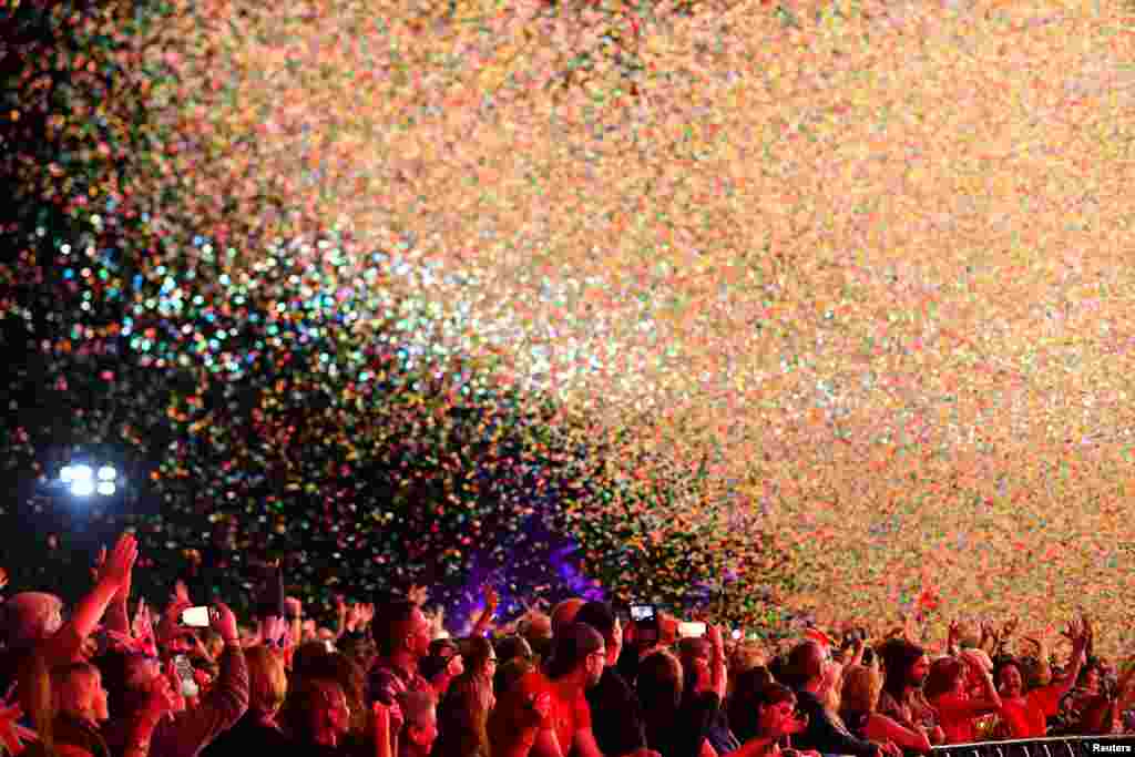 Confetti falls on revelers during &#39;The Last Night of the Proms&#39; celebration in Hyde Park, London, Sept. 14, 2018.