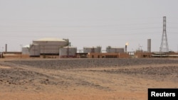 FILE - A view of the El Feel oil field near Murzuq, Libya, July 6, 2017.