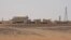 FILE - A view of the El Feel oil field near Murzuq, Libya, July 6, 2017.