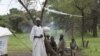 FILE- A refugee family from Sudan, having newly resettled in Gendrassa camp in Maban, Upper Nile State, South Sudan, on the border with Sudan, is seen August 2, 2012. 