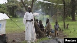 A refugee family from Sudan, having newly resettled in Gendrassa camp in Maban, Upper Nile State, South Sudan, on the border with Sudan. Taken 8.2.2012