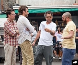 (L to R) Ed Helms, Bradley Cooper, director Todd Phillips and Zach Galifianakis on location during the production of Warner Bros. Pictures' and Legendary Pictures' comedy THE HANGOVER PART II, a Warner Bros. pictures release