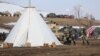 The U.S. National Guard attempt to clear the Oceti Sakowin camp near Cannon Ball, North Dakota, Feb. 23, 2017.