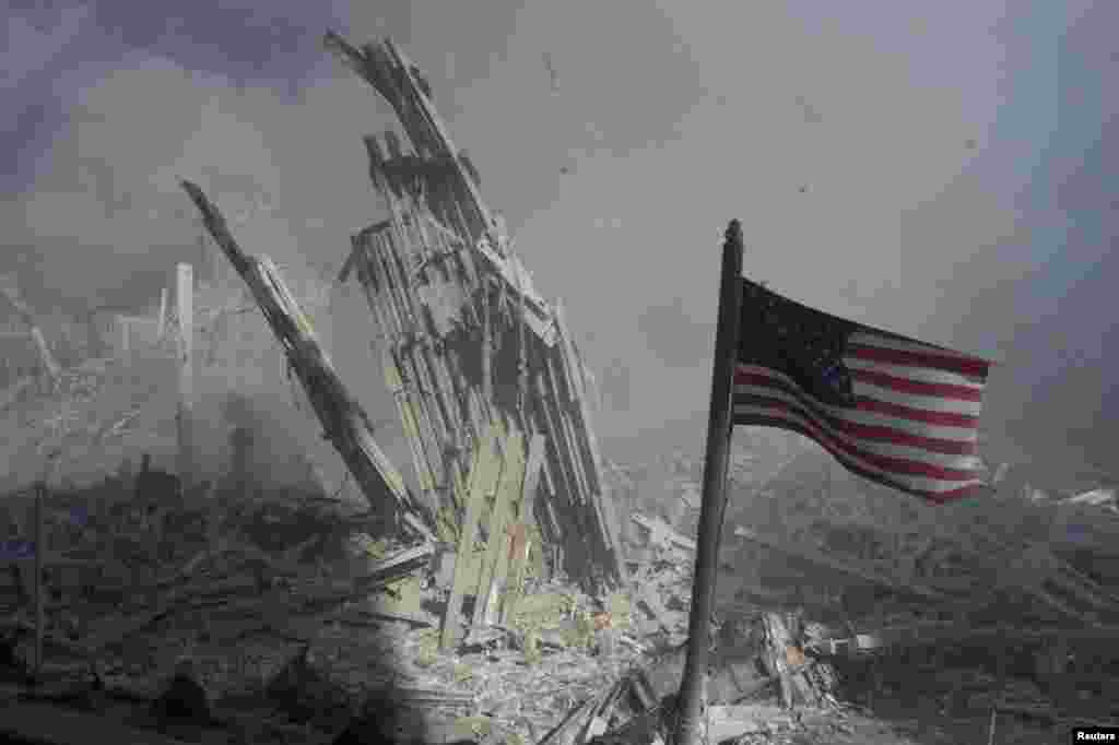 An American flag flies near the base of the destroyed World Trade Center in New York.