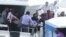 FILE - Officials carry an injured woman off the speed boat of Maldives' President Abdulla Yameen Abdul Gayoom after an explosion onboard, in Male, Sept. 28, 2015. 