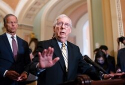 Senate Minority Leader Mitch McConnell, R-Ky., j talks with reporters at the Capitol in Washington, June 22, 2021.