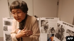 FILE - Kaz Suyeishi, of the American Society of Hiroshima-Nagasaki A-Bomb Survivors, describes seeing an atomic explosion over Japan during World War II, at a press conference in Los Angeles, California.