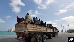 Migrant workers from Niger are transported into Misrata port to be evacuated by the IOM (International Organization for Migration) to Benghazi (File)
