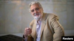 Spanish opera singer Placido Domingo poses for a portrait at the Dorothy Chandler Pavilion in Los Angeles, California, June 3, 2014. 