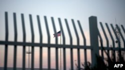 FILE - The American flag is pictured outside the Paso del Norte Port of Entry in El Paso, Texas, April 7, 2018.