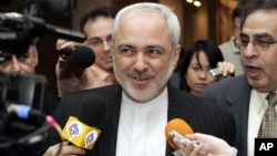 FILE - Javad Zarif, Iranian Ambassador to the United Nations speaks to reporters after Security Council consultations regarding Iraq, Iran and other matters at U.N. headquarters in New York, March 21, 2007