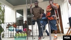 Liberian amputees in front of their home in Washington, D.C.