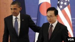 Presiden AS Barack Obama dan Presiden Korsel Lee Myung-bak dalam pertemuan di Seoul, Minggu (25/3).