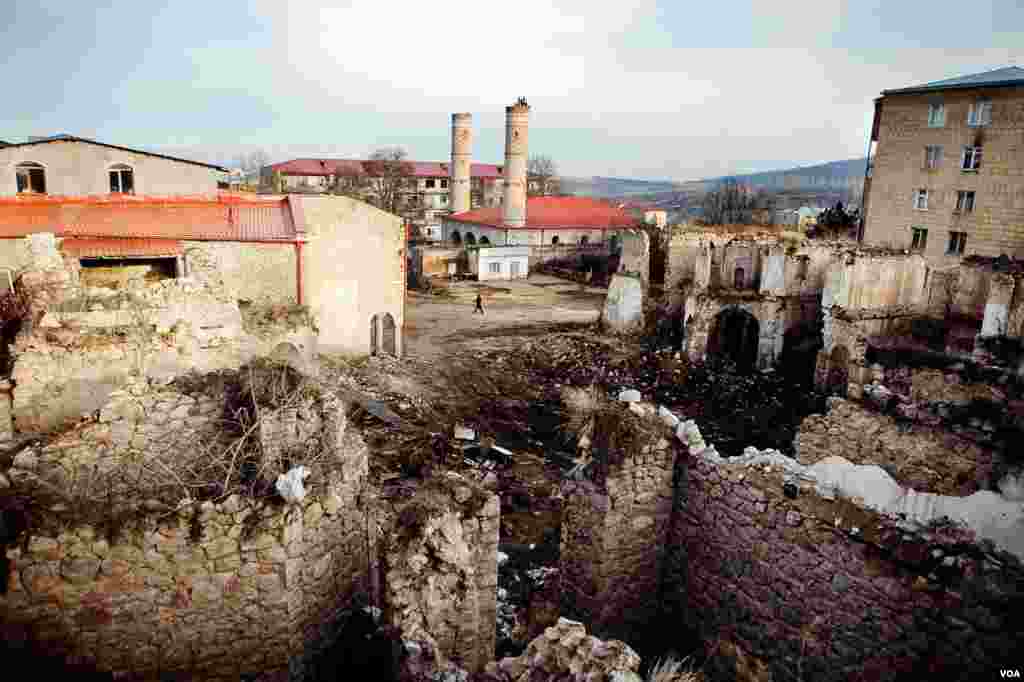 In Shushi, the twin minarets of an abandoned mosque are reminders that this mountaintop city violently changed hands between Muslim Azeris and Christian Armenians several times during the 20th century. (U. Filimonova)