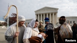 Actors dressed for a nativity scene held their annual "Live Nativity on Capitol Hill" on Tuesday.