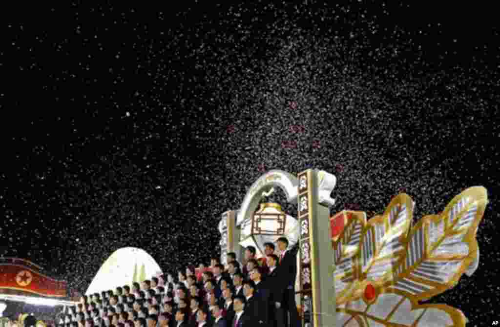 North Korean singers perform at Kim Il Sung Square in Pyongyang, North Korea, to celebrate 100 years since the birth of the North Korean founder Kim Il Sung, Monday, April 16, 2012. (AP Photo/Vincent Yu)