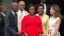 In this May 23, 2018, file photo, Haiti's President Jovenel Moise, left, and First Lady Martine Moise, in red, receive Spain's Queen Letizia Ortiz at the national Palace in Port-au-Prince, Haiti, Wednesday, May 23, 2018. (AP Photo/Dieu Nalio Chery, File)