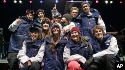 Members of the U.S. Olympic freeskiing team pose for a photo following the U.S. Grand Prix in Park City, Utah, Jan. 18, 2014. 