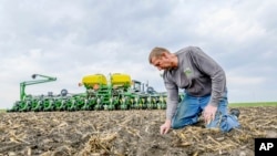 This 2018 photo shows Jeff Frank on his farm near Auburn, Iowa. Frank doesn’t feel rich, but simply based on the skyrocketing value of his land in northwest Iowa, it’s an apt way to describe him, even if he laughs at the idea.