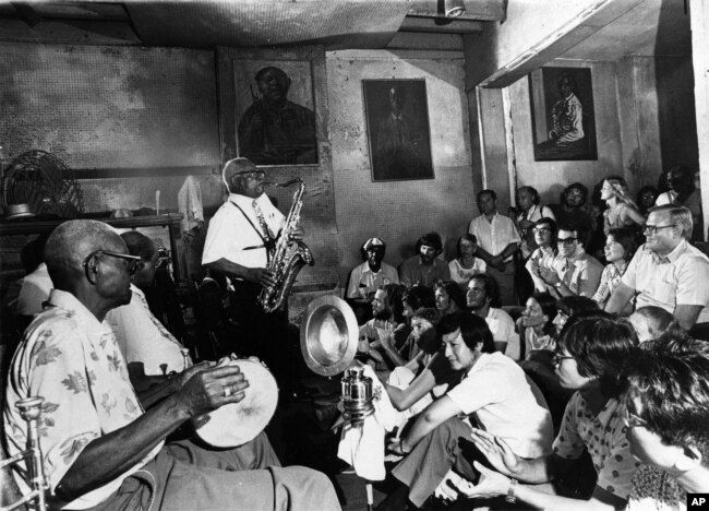 The musicians of Preservation Hall entertain jazz fans in the French Quarter of New Orleans, May 12, 1964.