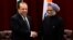 Pakistan's Prime Minister Nawaz Sharif (L) shakes hands with India's Prime Minister Manmohan Singh during the United Nations General Assembly in New York, Sept. 29, 2013.