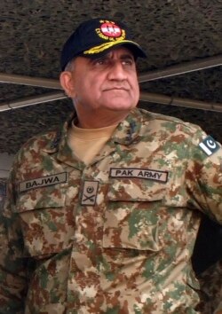 FILE - Pakistan's army senior officer Lt. Gen. Qamar Javed Bajwa attends a military exercise in Khairpur Tamiwali, Pakistan, Nov. 16, 2016.
