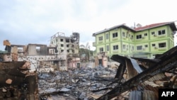 This photo taken on July 1, 2024 shows a destroyed house following fighting between Myanmar's military and the Ta'ang National Liberation Army (TNLA) ethnic armed group in Kyaukme in Myanmar's northern Shan State.