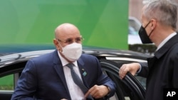 FILE: Mauretania's President Mohamed Ould Cheikh El Ghazouani arrives for an EU Africa summit at the European Council building in Brussels. Taken Thurs. Feb. 17, 2022.