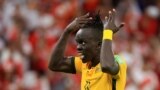 FILE: South Sudan footballer Awer Mabil celebrates after scoring a penalty during the shootout between Australia vs Peru in the FIFA World Cup Qualifier - Al Rayyan Stadium, Al Rayyan, Qatar - June 13, 2022 