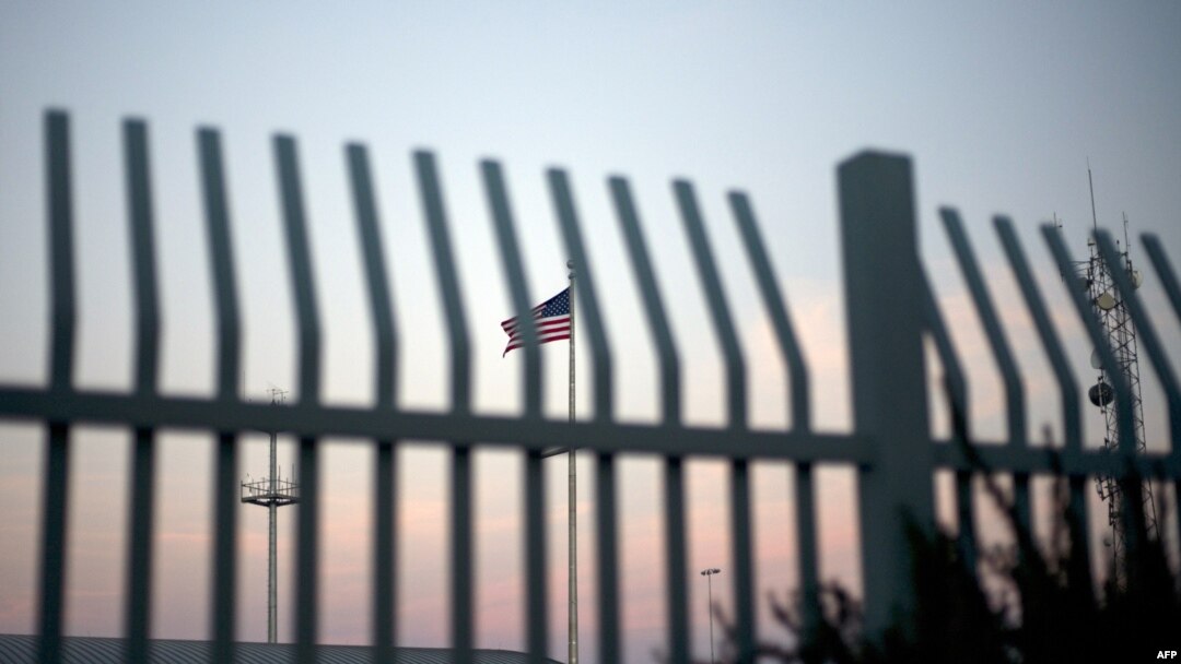 FILE - The American flag is pictured outside the Paso del Norte Port of Entry in El Paso, Texas, April 7, 2018.