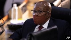 Former South African President Jacob Zuma appears at the hearing for his application for Deputy Chief Justice Raymond Zondo, to recuse himself from the state capture commission inquiry in Johannesburg, South Africa, Monday, Nov. 16, 2020. (AP Photo…