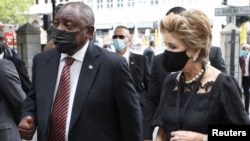 South African President Cyril Ramaphosa greets Elita de Klerk, widow of former President FW de Klerk at the state memorial service in Cape Town, South Africa, Dec. 12, 2021. 