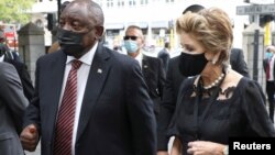 South African President Cyril Ramaphosa greets Elita de Klerk, widow of former President FW de Klerk at the state memorial service in Cape Town, South Africa, Dec. 12, 2021. 