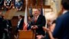 FILE - U.S. Secretary of State Mike Pompeo, center, smiles as he arrives for a meeting of the senate in Prague, Czech Republic, Aug. 12, 2020. 